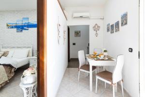Postel nebo postele na pokoji v ubytování B&B VESUVIAN STONE