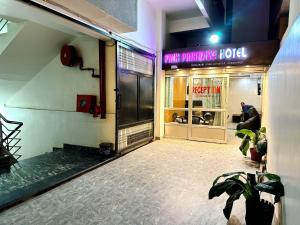 a store front with a sign that readsarma miracle hotel at Hotel Pink Paradise in Gorakhpur