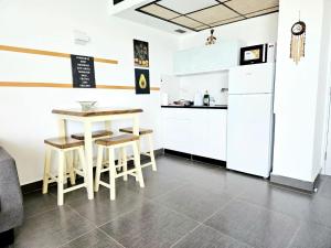 Una cocina o cocineta en GO to apartments in Leonardo