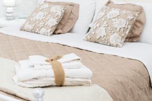 Postel nebo postele na pokoji v ubytování B&B VESUVIAN STONE