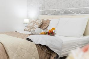 Postel nebo postele na pokoji v ubytování B&B VESUVIAN STONE