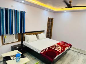 Ένα ή περισσότερα κρεβάτια σε δωμάτιο στο Hotel Pink Paradise +11 φωτογραφίες
