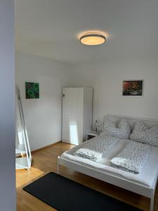 Postel nebo postele na pokoji v ubytování Appartement Telfs