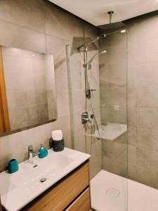 a bathroom with a shower and a sink at Cosy apartment with terrasse at in CFC in Casablanca