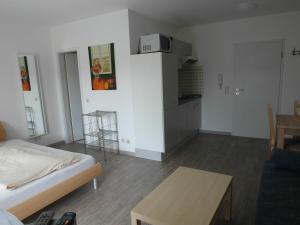 Ein Bett oder Betten in einem Zimmer der Unterkunft Apartmentcenter Koblenz