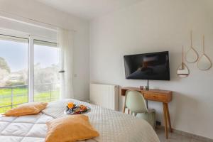 TV a/nebo společenská místnost v ubytování abk apartment