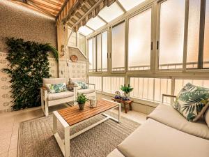 a living room with a couch and a table at La Mata dream in La Mata