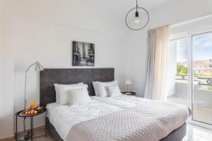 Postel nebo postele na pokoji v ubytování abk apartment
