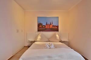 Postel nebo postele na pokoji v ubytování Am Rosenhain 9 Am Rosenhain 9 Appartement 3