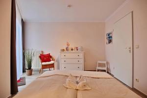 Postel nebo postele na pokoji v ubytování Am Rosenhain 9 Am Rosenhain 9 Appartement 3