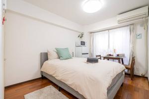 Katil atau katil-katil dalam bilik di 新宿中心地歌舞伎町紧邻伊势丹电器城免费Wi-Fi。