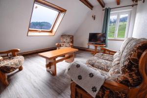 TV a/nebo společenská místnost v ubytování La ferme au gîte. (accepte les animaux)