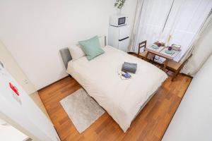 Katil atau katil-katil dalam bilik di 新宿中心地歌舞伎町紧邻伊势丹电器城免费Wi-Fi。
