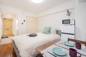 Katil atau katil-katil dalam bilik di 新宿中心地歌舞伎町紧邻伊势丹电器城免费Wi-Fi。