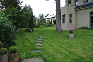 a path in the yard of a house at Klanhome in Prague