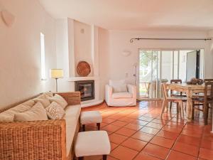 a living room with a couch and a table at Villa Vale de Ursa - 16 - BY BEDZY in Sesmarias