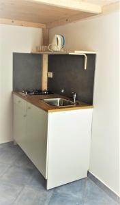 Residence e appartamenti Bausan tesisinde mutfak veya mini mutfak