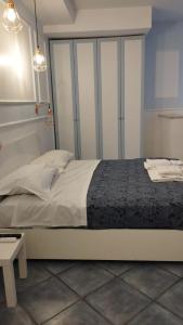 Residence e appartamenti Bausan tesisinde bir odada yatak veya yataklar