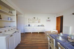 Kuchyň nebo kuchyňský kout v ubytování La Corte di Nonna Gemma - Holiday Home