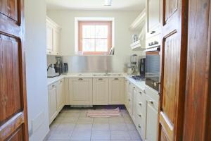 Kuchyň nebo kuchyňský kout v ubytování La Corte di Nonna Gemma - Holiday Home