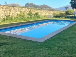 a swimming pool in the yard of a house at Chambray Estate - The Terraces in the Vines in Franschhoek