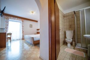 Koupelna v ubytování Zilli Rooms