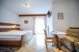 Postel nebo postele na pokoji v ubytování Zilli Rooms