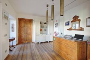 Kuchyň nebo kuchyňský kout v ubytování La Corte di Nonna Gemma - Holiday Home