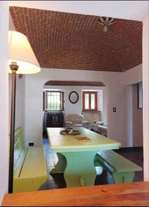 a living room with a table and a couch at Casa Niva in Lerma +14 photos
