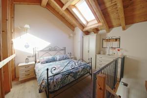 Postel nebo postele na pokoji v ubytování La Corte di Nonna Gemma - Holiday Home