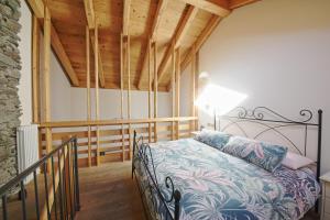 Postel nebo postele na pokoji v ubytování La Corte di Nonna Gemma - Holiday Home