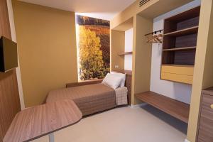 Postel nebo postele na pokoji v ubytování CASA LORENZO