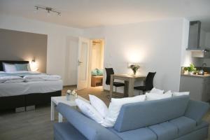 Ένα ή περισσότερα κρεβάτια σε δωμάτιο στο Hotel Claro Garni