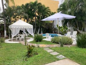 Сад в Encantadora Casa Zona Dorada Brisas Beach 10% DESC