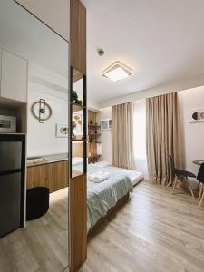 Giường trong phòng chung tại UNIT B218