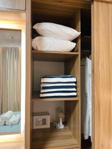 Giường trong phòng chung tại UNIT B218