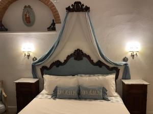 Postel nebo postele na pokoji v ubytování Casa Rosie