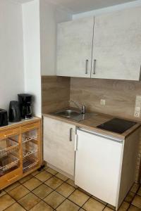Küche/Küchenzeile in der Unterkunft Apartment Muschelweg-1 by Interhome