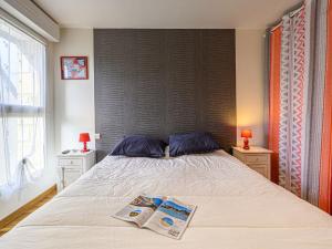 En eller flere senge i et værelse på Apartment Le SudOuest by Interhome