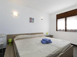 Posteľ alebo postele v izbe v ubytovaní Holiday Home Paloma 2-3 by Interhome