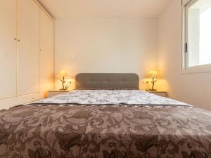 Cama o camas de una habitación en Apartment Dragos by Interhome