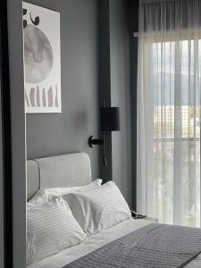 Postel nebo postele na pokoji v ubytování Mulaj Hotel