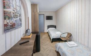 TV a/nebo společenská místnost v ubytování Lotus Hotel