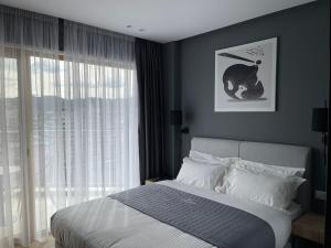 Postel nebo postele na pokoji v ubytování Mulaj Hotel
