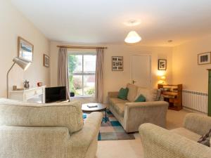 Televiisor ja/või meelelahutuskeskus majutusasutuses Holiday Home Glenpark by Interhome