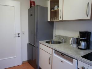a kitchen with a stainless steel refrigerator and a sink at Apartment Blechnerhof-2 by Interhome in Hinterfalkau