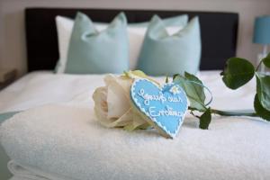 Ένα ή περισσότερα κρεβάτια σε δωμάτιο στο Hotel Claro Garni