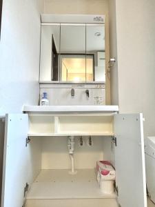 Dapur atau dapur kecil di 大人気黒門市場徒歩1分 日本橋駅徒歩2分 道顿堀 難波 心斎橋徒歩圏内 金悦マンション +35 gambar