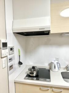 Dapur atau dapur kecil di 大人気黒門市場徒歩1分 日本橋駅徒歩2分 道顿堀 難波 心斎橋徒歩圏内 金悦マンション