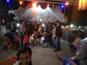 a group of people posing for a picture under a tent at Goroomgo Moon Nainital Near Naini Lake - Parking & Lift Facilities -Hygiene and Spacious Room - Best Seller in Nainital